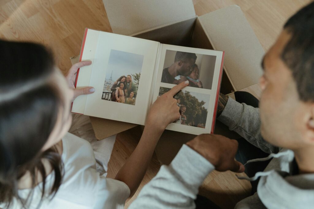 Family looking album together